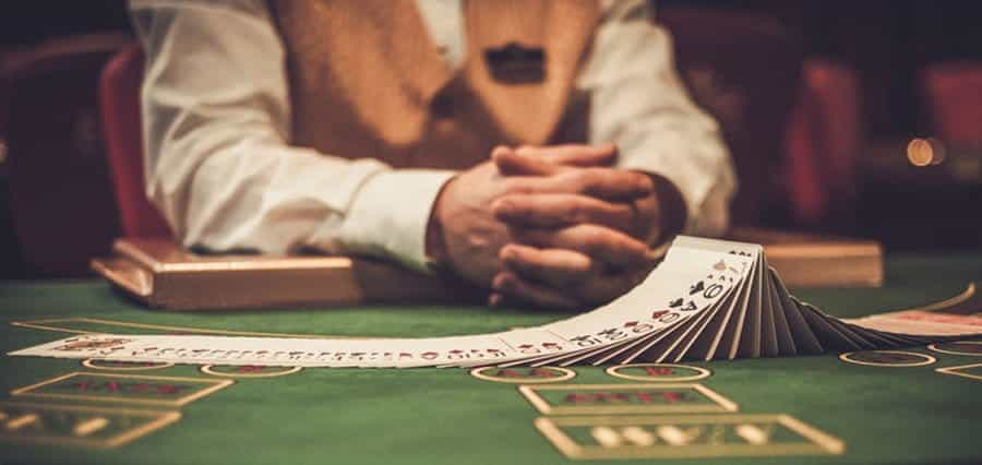 A man sits at a poker table.