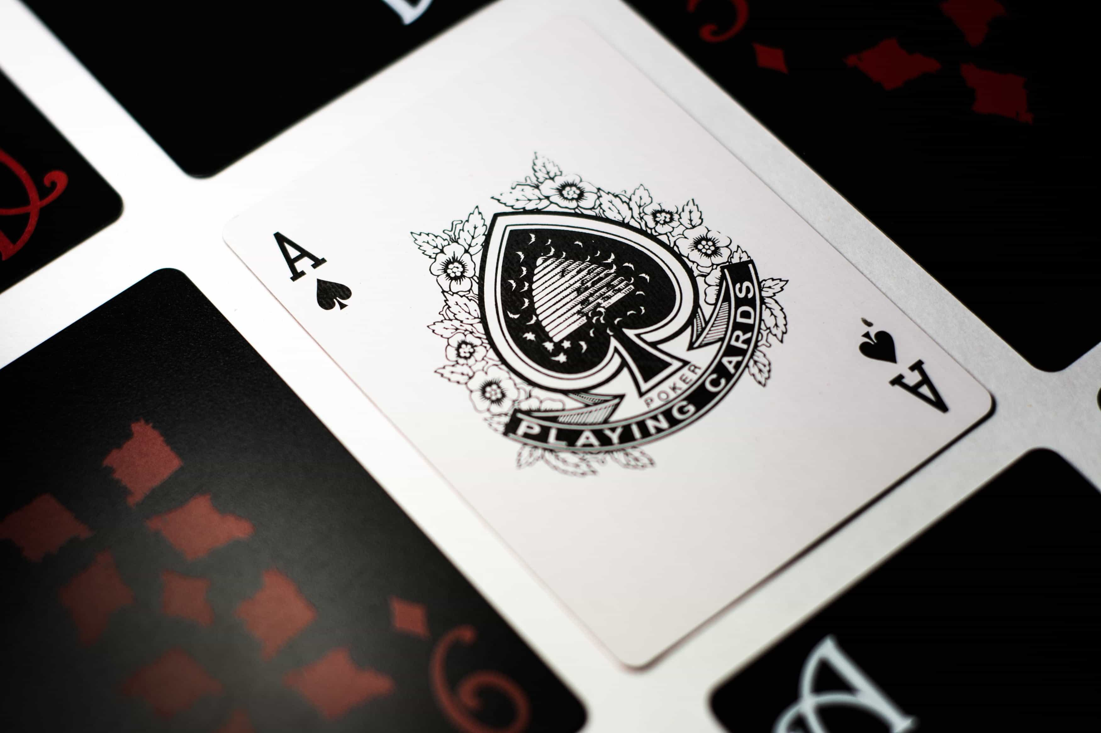 An Ace of Spades appears face up amidst face down cards.