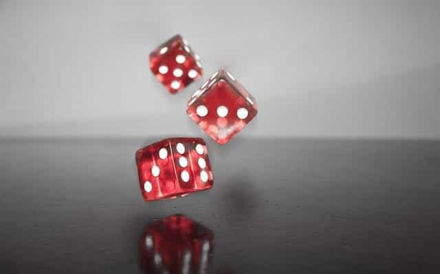 Red dice falling.