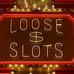 Neon 'Loose & Slots' sign from a Las Vegas casino.