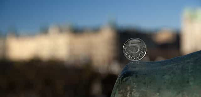 Swedish money with Stockholm in the backdrop.