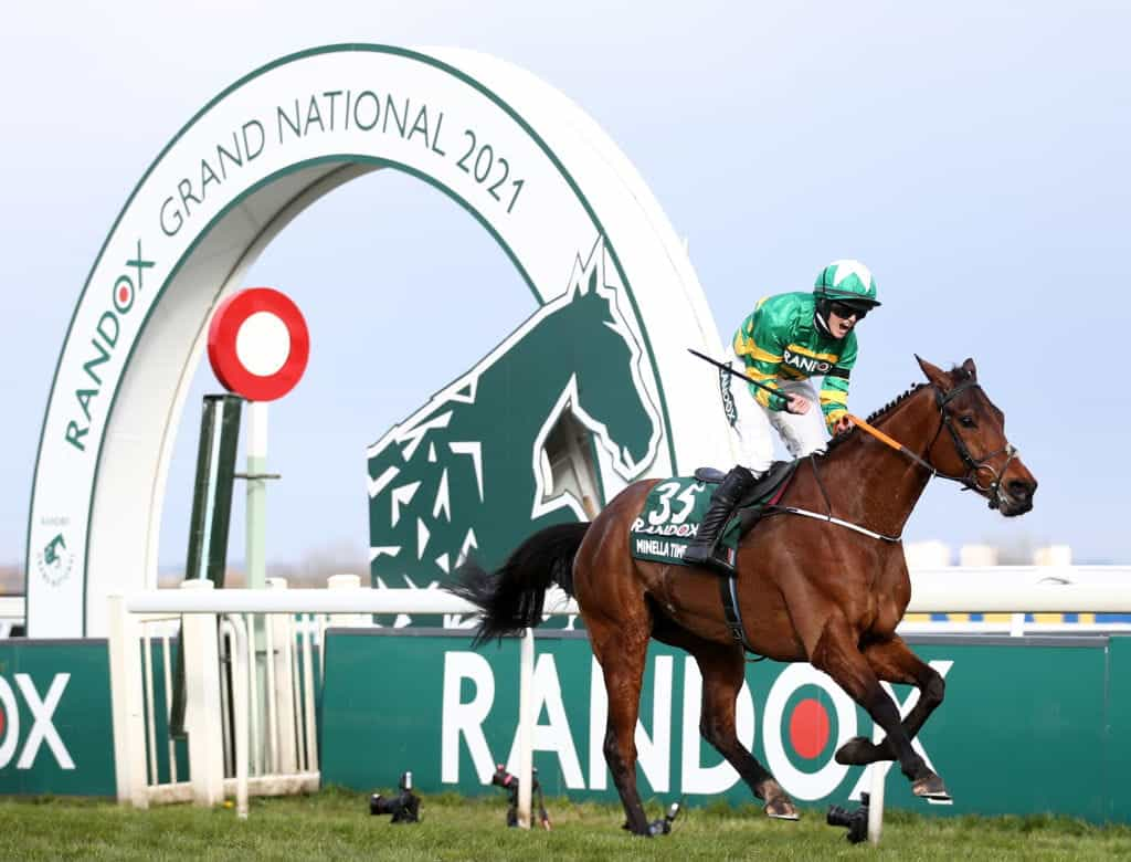 Rachael Blackmore and Minella Times cross the line ahead in the 2021 Grand National.