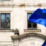 An EU flag waving during the day.