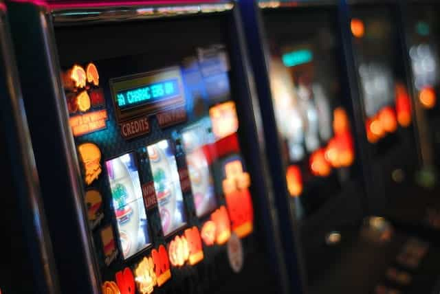 A bright and blurred slot machine front.