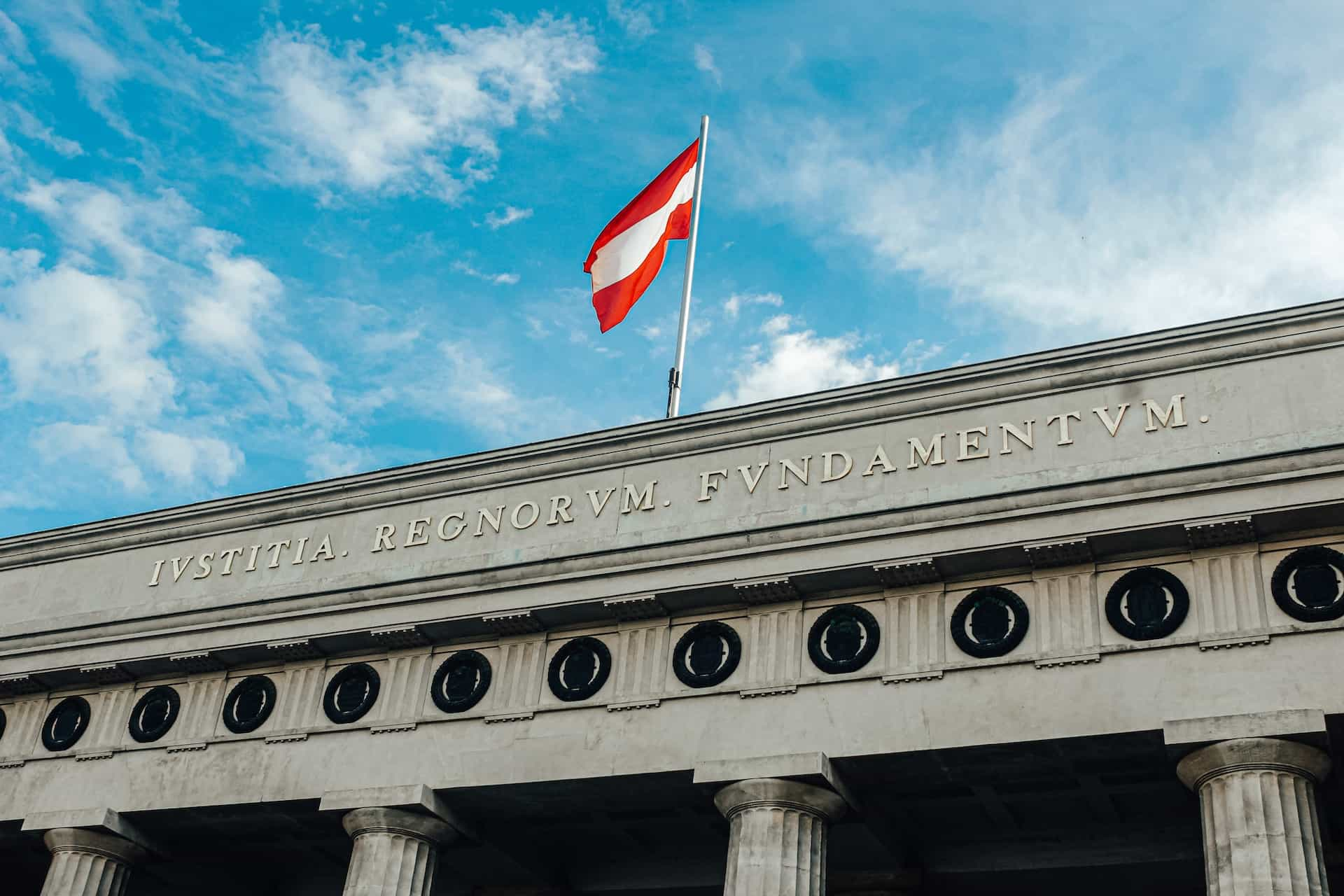 Austrian flag atop the Hofburg palace.