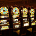 An image showing slot machinesat a casino.